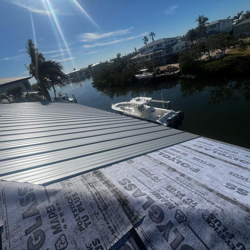 Standing seam metal roof with high temp peel and stick underlayment Standing seam metal roof with high temp peel and stick underlayment