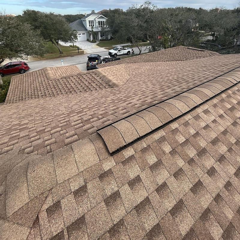 Architectural shingle roof with ridge vent in Florida Architectural shingle roof with ridge vent in Florida