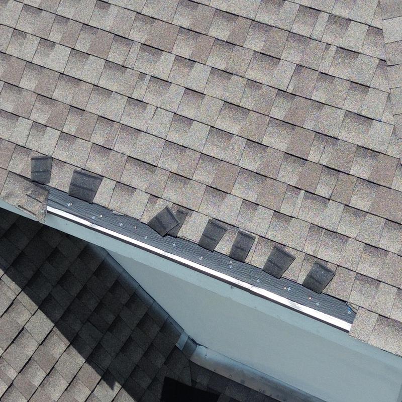 GAF weather wood shingles installation on roof ridge GAF weather wood shingles installation on roof ridge