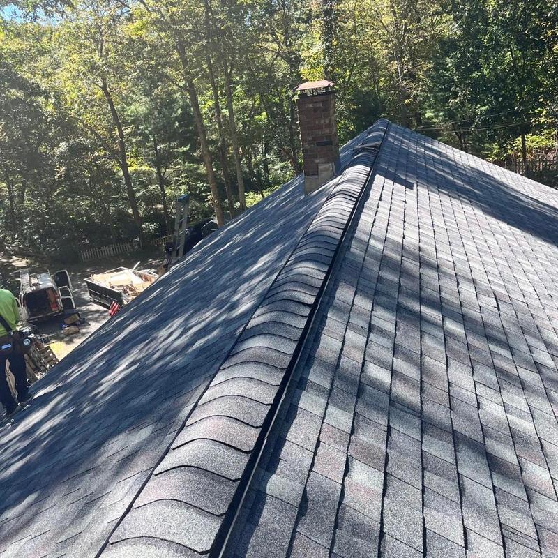Asphalt shingle roof installation with ridge cap in East Lyme Asphalt shingle roof installation with ridge cap in East Lyme