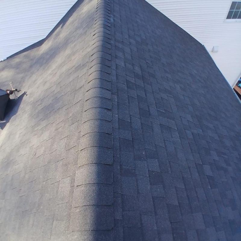 Asphalt shingle roof ridge with clean installation in Colchester Asphalt shingle roof ridge with clean installation in Colchester