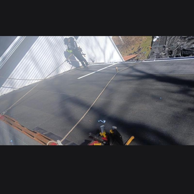 Flat roof installation in Colchester with safety lines Flat roof installation in Colchester with safety lines