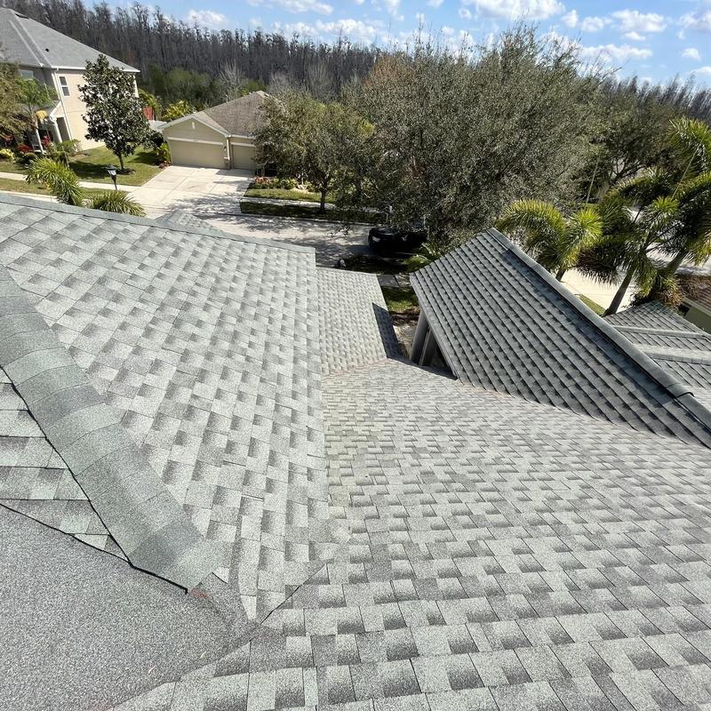 Architectural shingle roof with dead valley installation Architectural shingle roof with dead valley installation