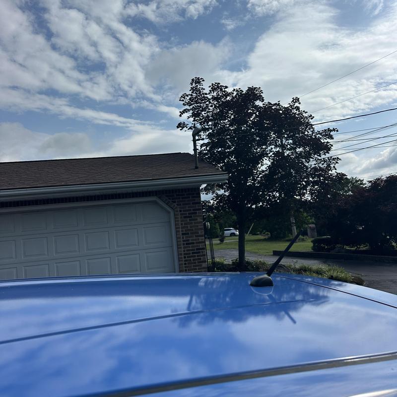 Residential asphalt shingle roof on brick garage Residential asphalt shingle roof on brick garage