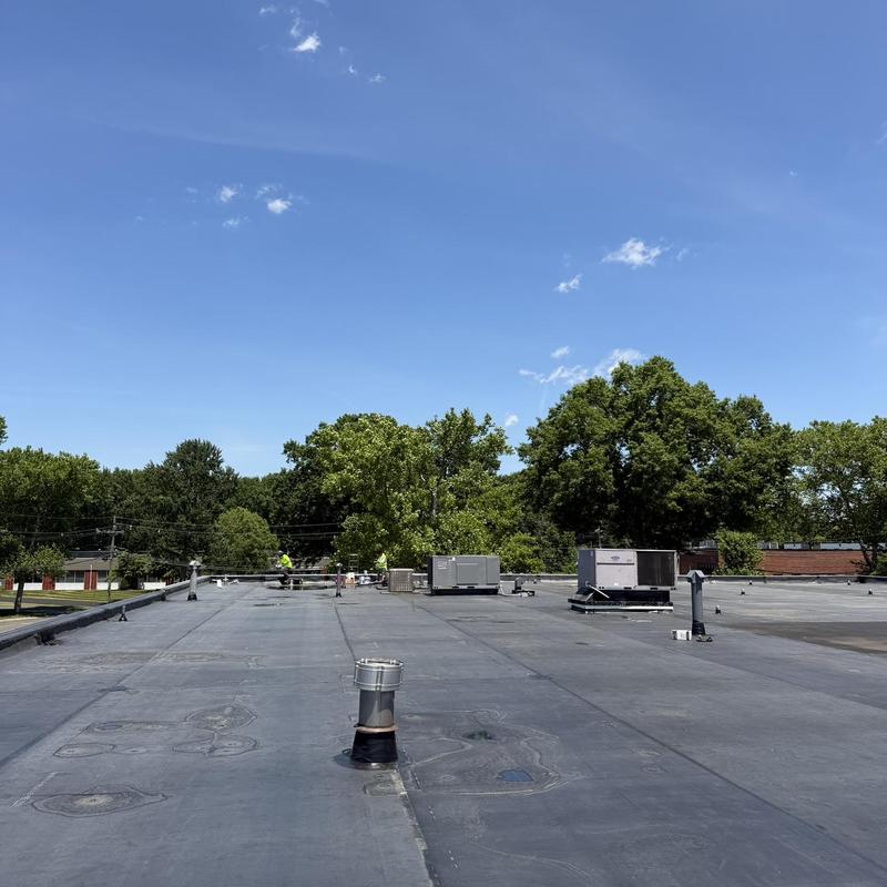 EPDM membrane roofing with vents and HVAC units EPDM membrane roofing with vents and HVAC units