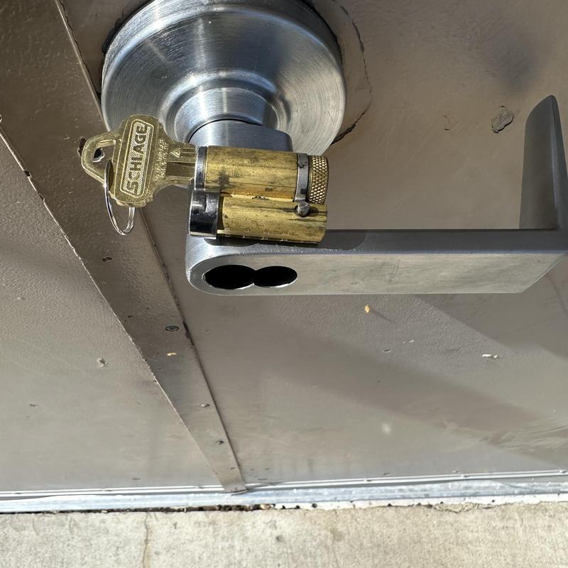 Schlage interchangeable core cylinder with key on door handle