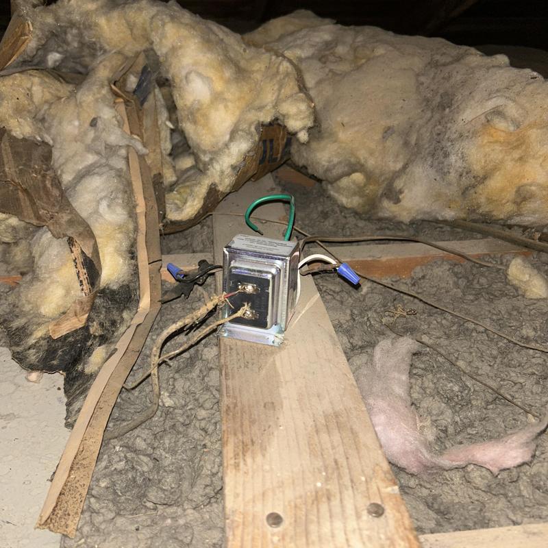 Doorbell transformer with exposed wiring in attic space Doorbell transformer with exposed wiring in attic space