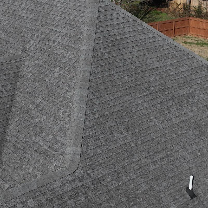 Asphalt shingle roof with ridge vent installation