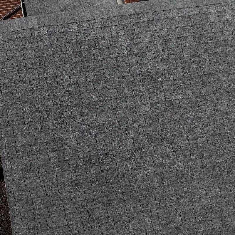 Asphalt shingle roof showing hail damage inspectiorn