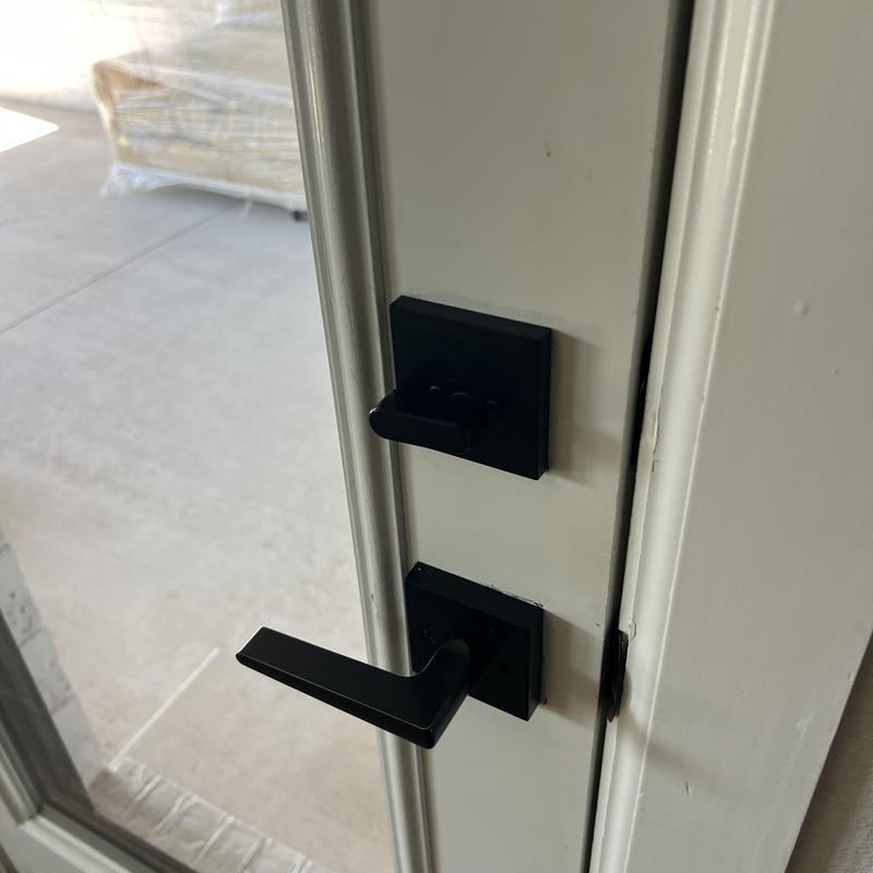 Door lever lock and deadbolt in black finish