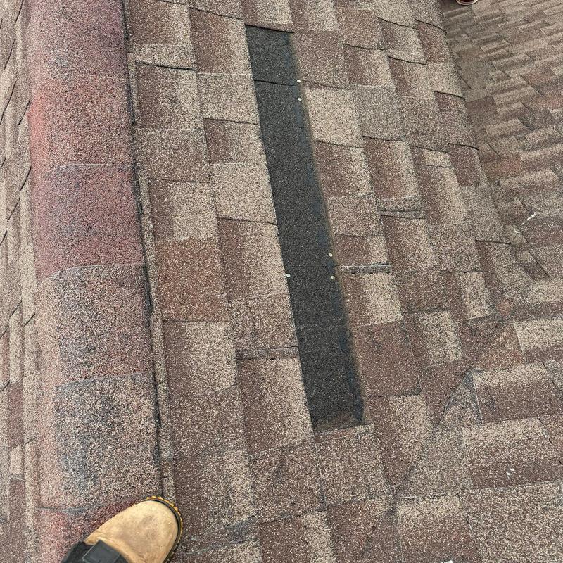 Roof shingles showing hail damage and wear signs