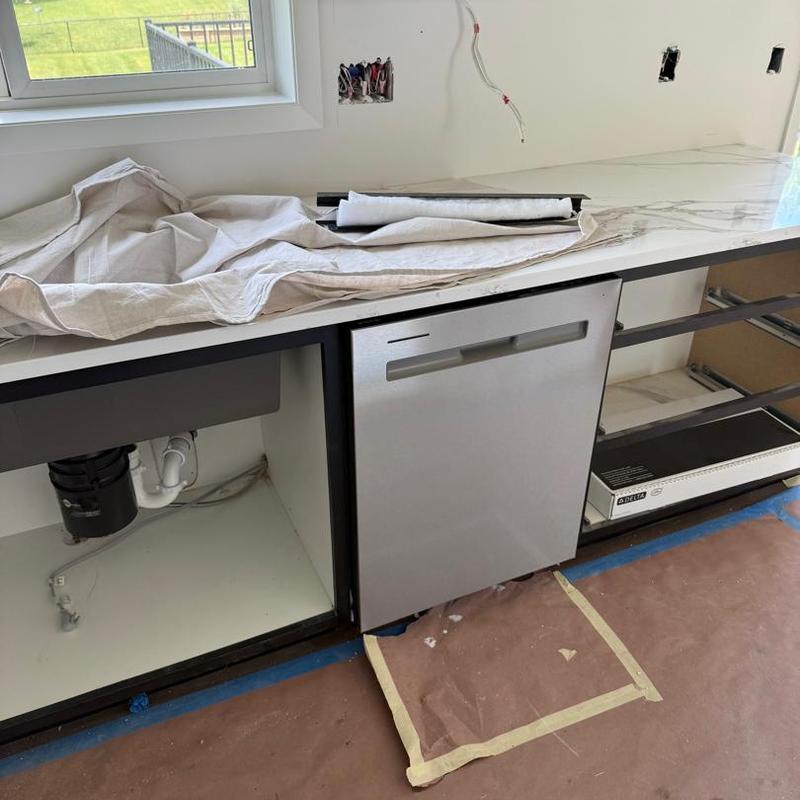 Dishwasher installation in kitchen remodel with countertop
