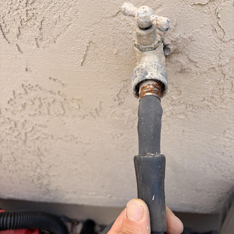 Outdoor hose bibb with attached garden hose connector Outdoor hose bibb with attached garden hose connector
