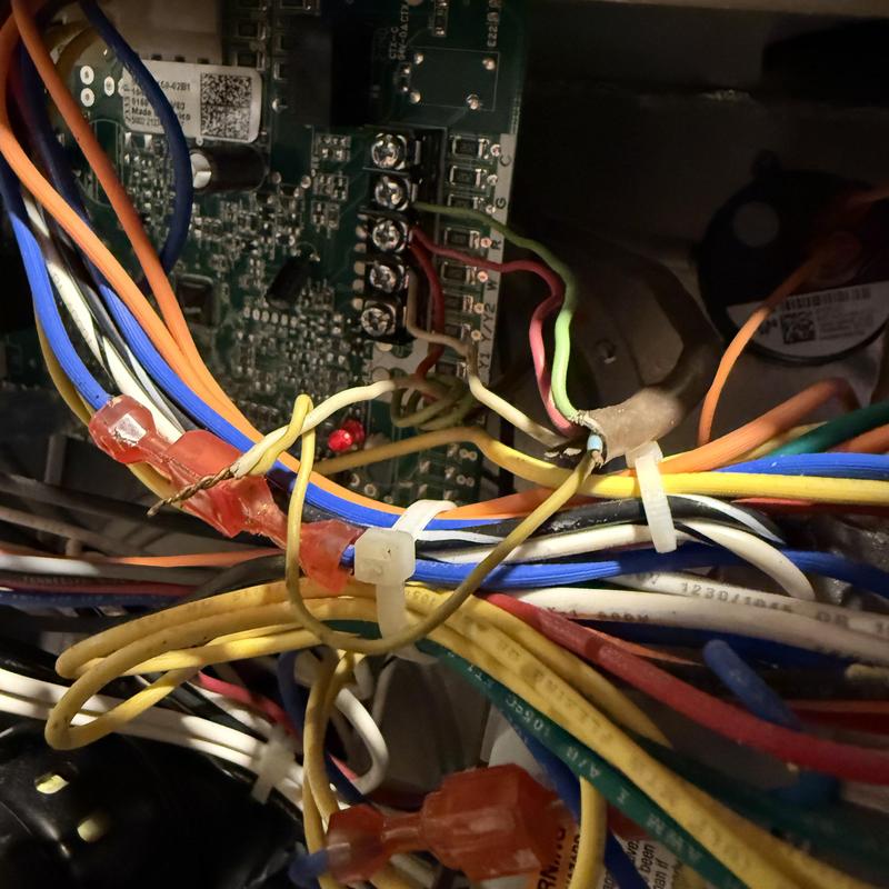 Air conditioner control board wiring connections close-up Air conditioner control board wiring connections close-up