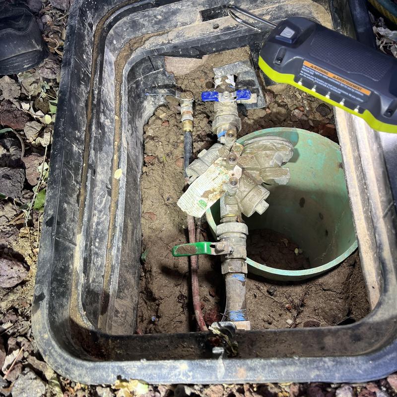 Backflow preventer and stop in waste valve assembly Backflow preventer and stop in waste valve assembly