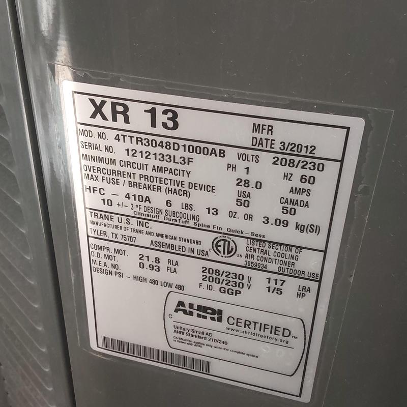 Trane XR13 air conditioner unit label showing specs