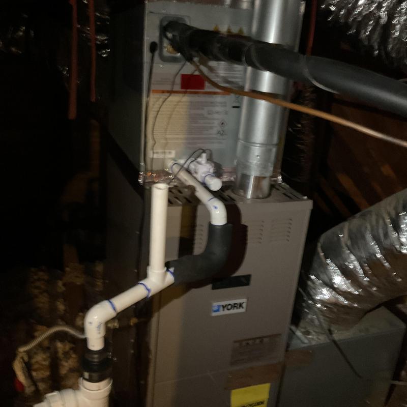 Furnace condensate drain line with PVC piping and insulation Furnace condensate drain line with PVC piping and insulation