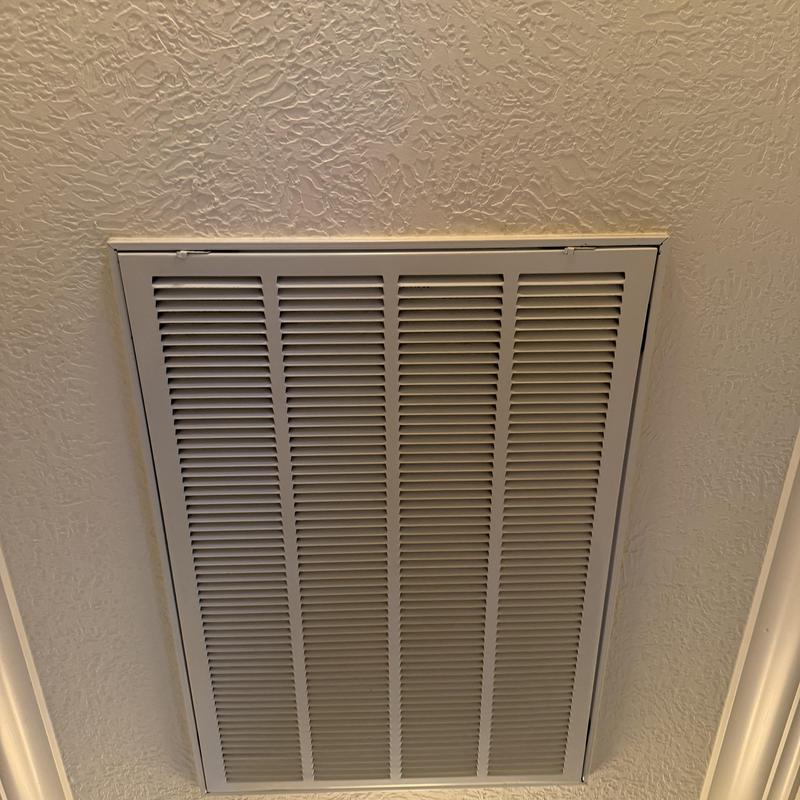 Return air vent grille on textured ceiling Return air vent grille on textured ceiling