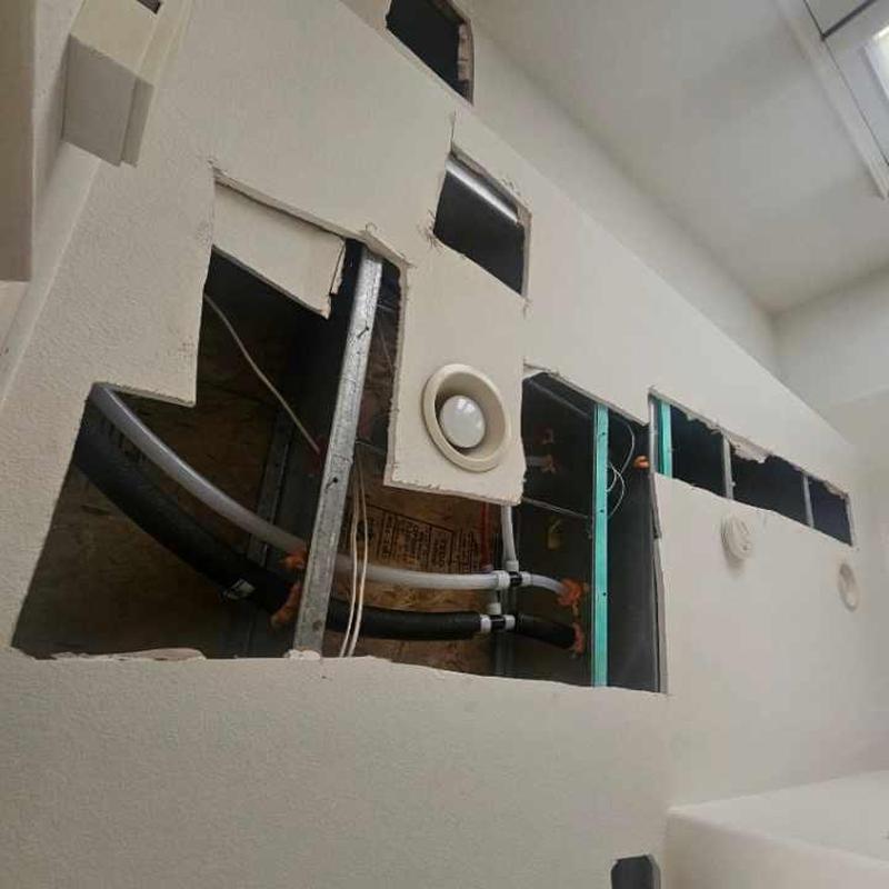 Uponor PEX repipe behind drywall in wall cavity