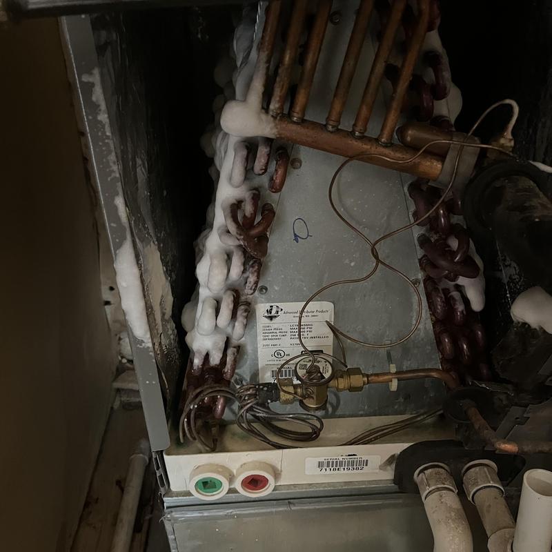 Evaporator coil with frost buildup and wiring connections Evaporator coil with frost buildup and wiring connections