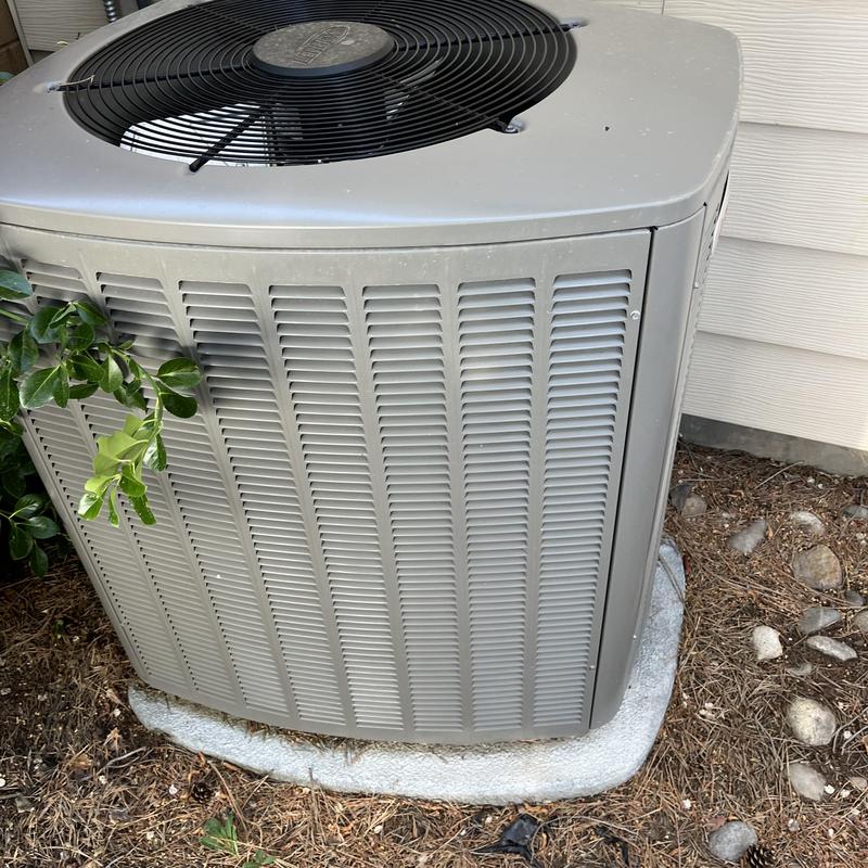 Central AC condenser unit outside home in Boise ID Central AC condenser unit outside home in Boise ID