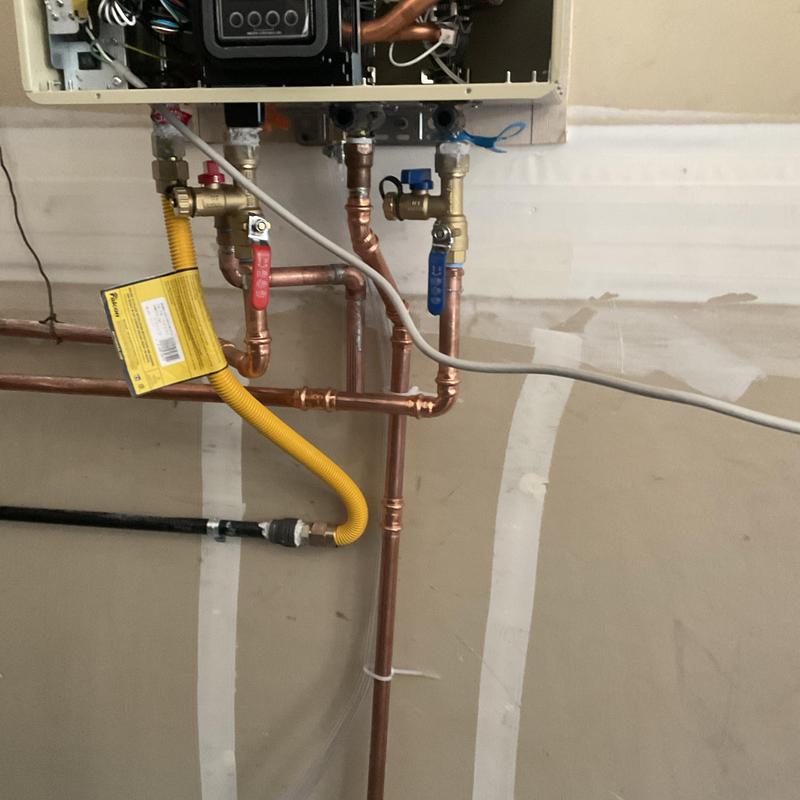 Tankless water heater piping with gas line and valves Tankless water heater piping with gas line and valves