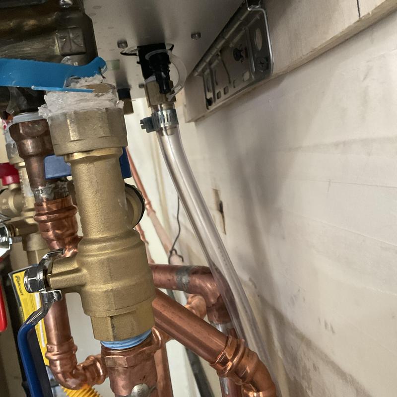 Tankless water heater piping with valve and fittings Tankless water heater piping with valve and fittings