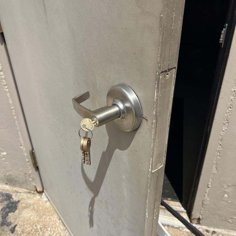 Commercial door lock with keys hanging in Tulsa business