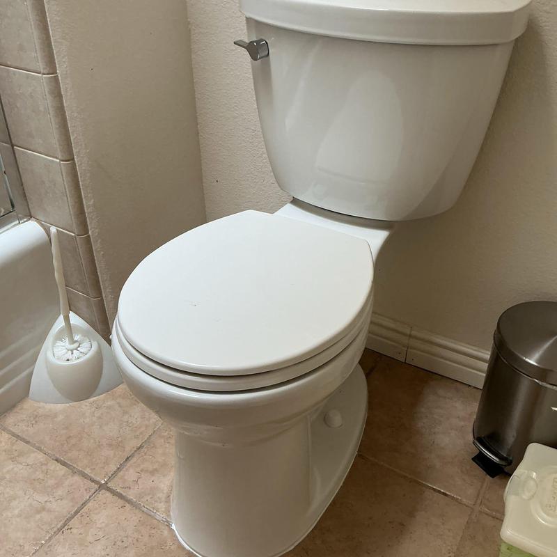 Toilet with new wax seal and water supply line installation