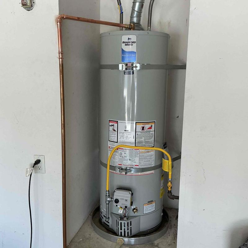 Bradford White water heater with copper piping and drip pan Bradford White water heater with copper piping and drip pan