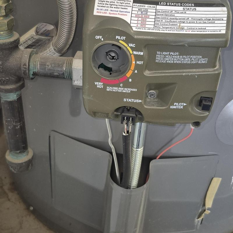 Gas water heater control panel with temperature dial