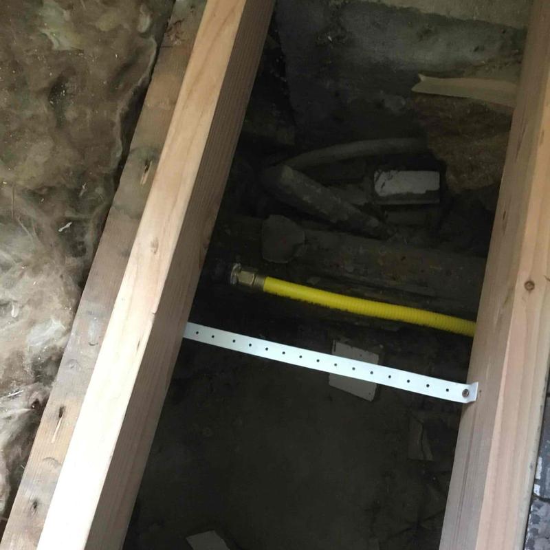 Gas flex line connection under crawl space flooring Gas flex line connection under crawl space flooring