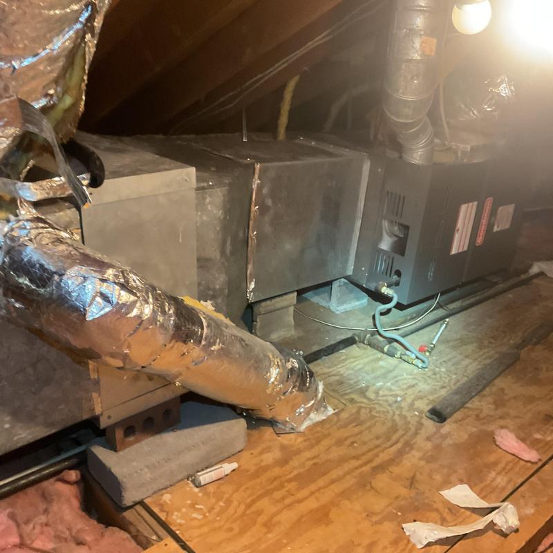 Forced air furnace and ductwork in attic system