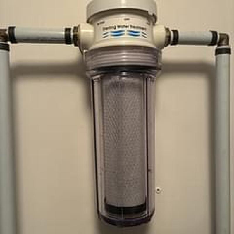 Inline carbon water filter housing with pipes Inline carbon water filter housing with pipes