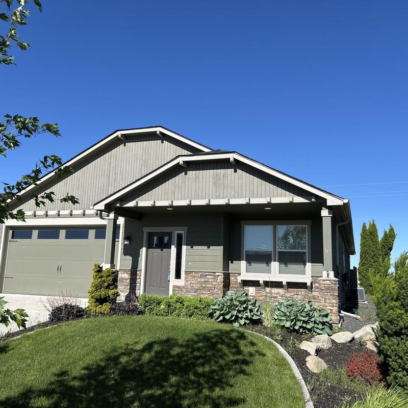 Asphalt shingle roof with minor repair needs on house
