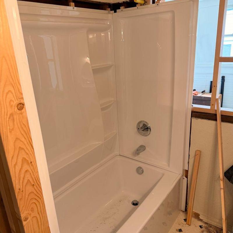 Tub shower stall installation with Delta valve and drain