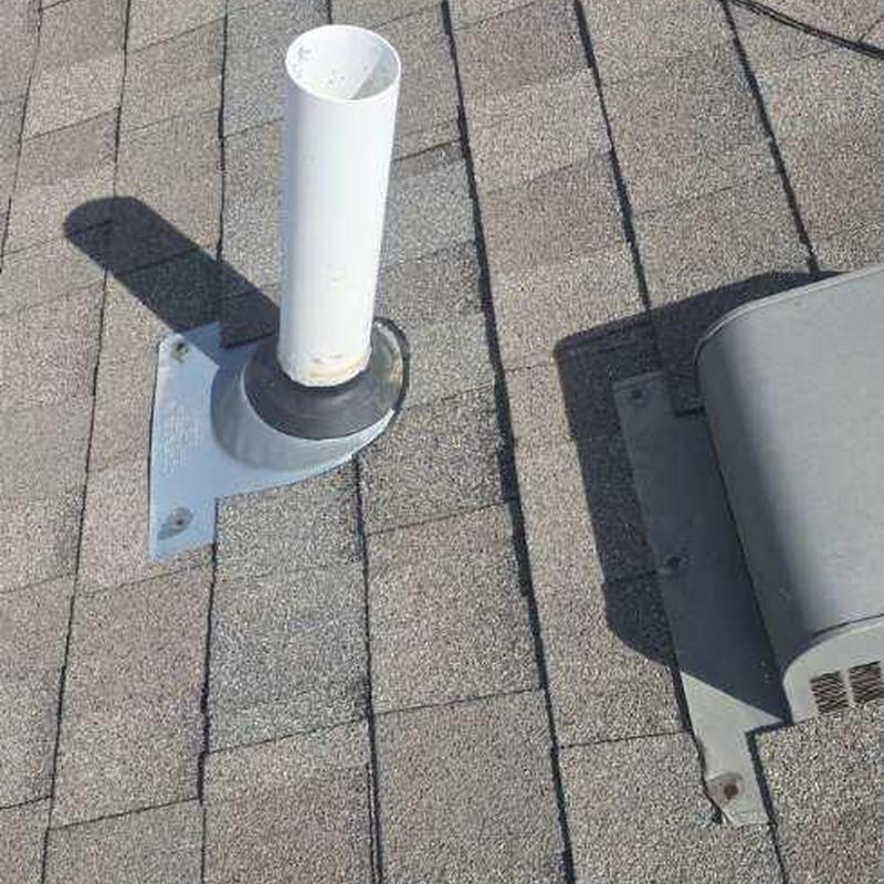 Roof vent pipe flashing on asphalt shingle roof