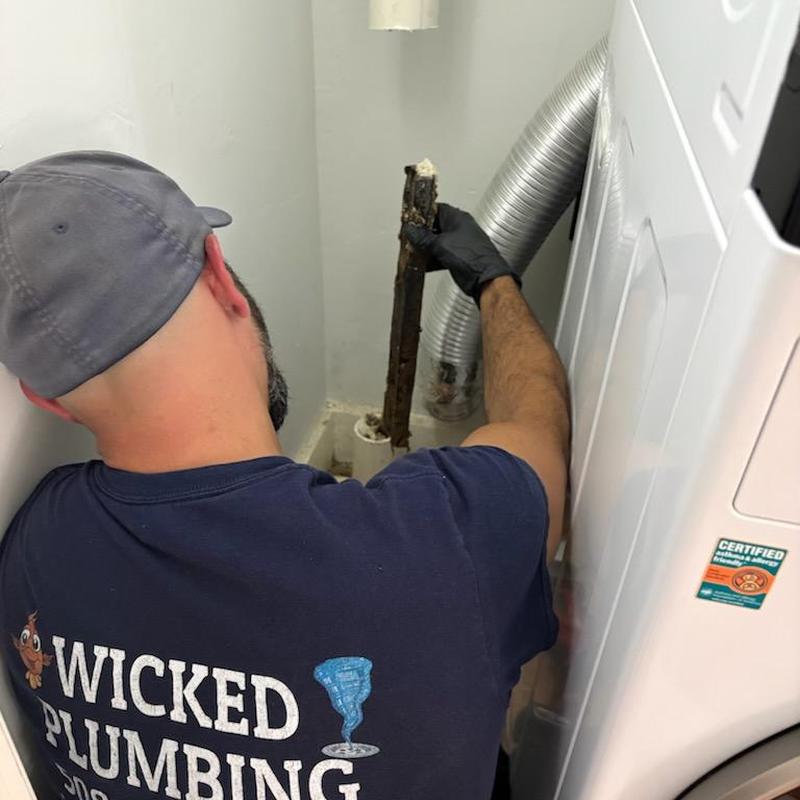 Drain pipe clog removal with lodged wood piece