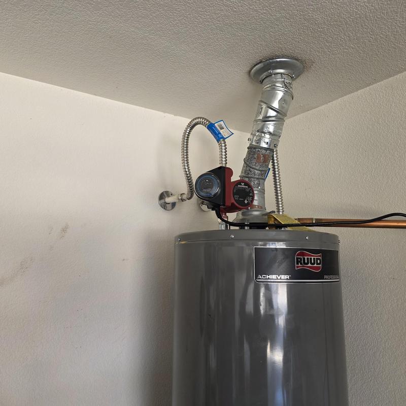 Hot water recirculation pump installed on water heater Hot water recirculation pump installed on water heater
