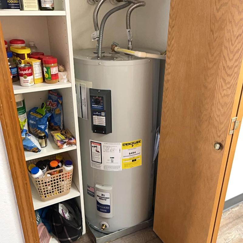 Bradford White electric water heater in closet