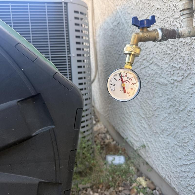 Outdoor water spigot with pressure gauge in Glendale, AZ