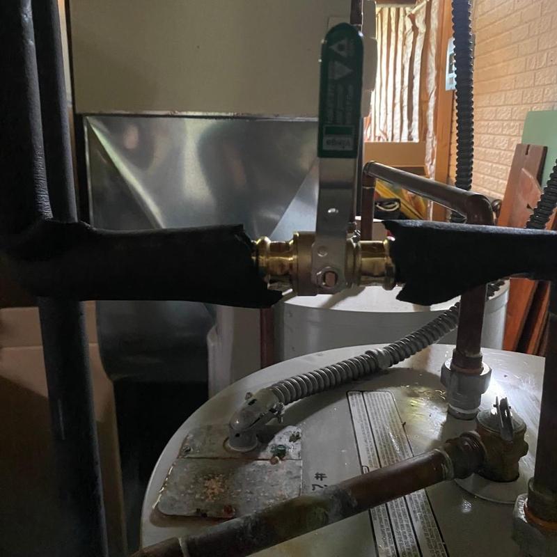 Hot water heater valve with insulated piping