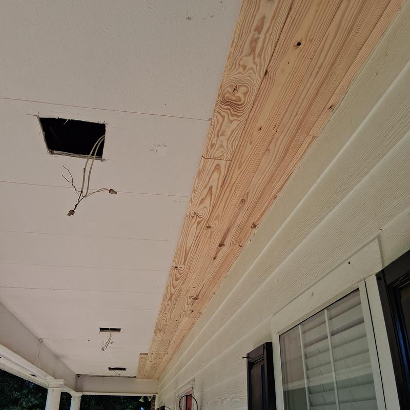 Tongue and groove ceiling installation on porch ceiling
