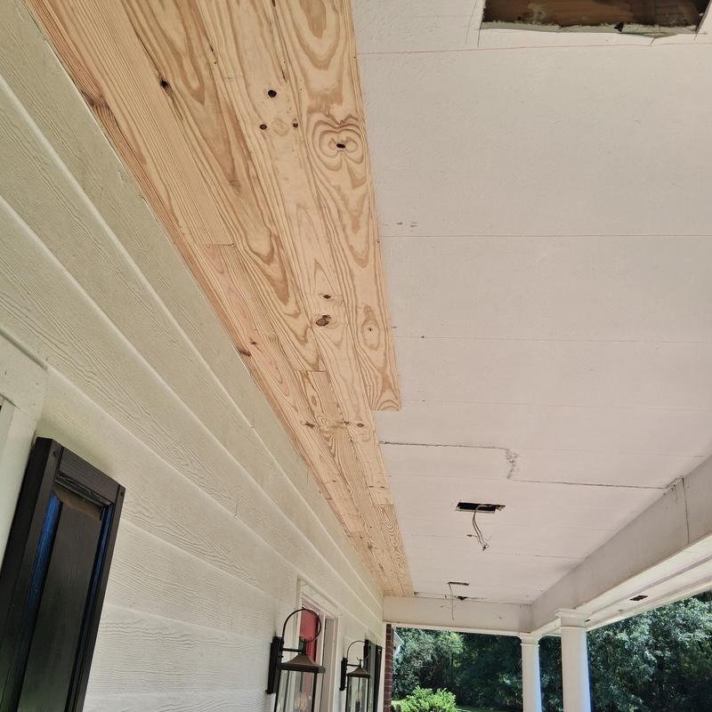 Tongue and groove ceiling panel installation on porch