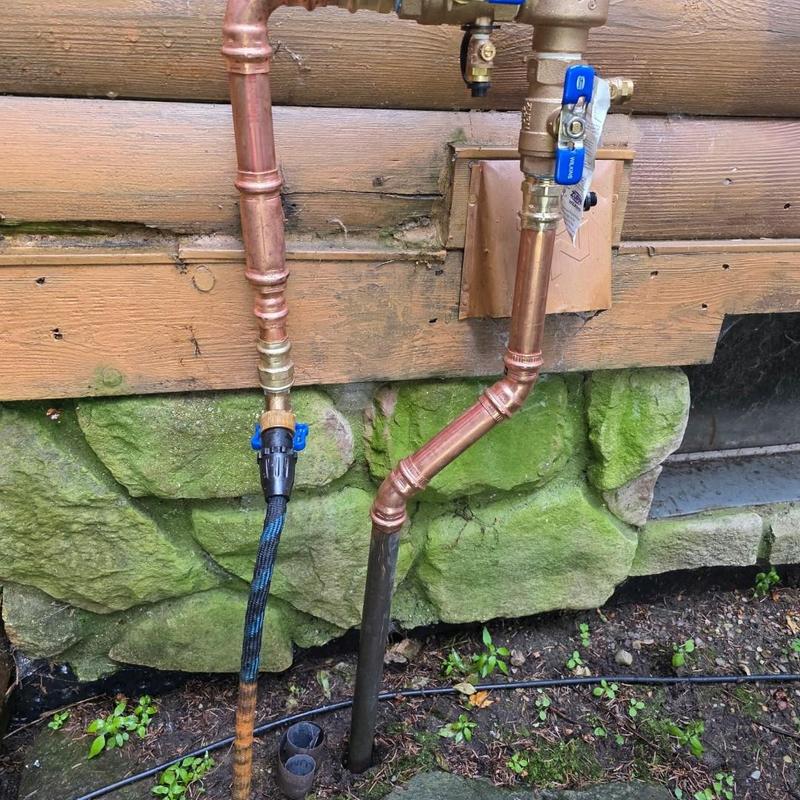 Copper water supply pipes with pressure vacuum breaker installation