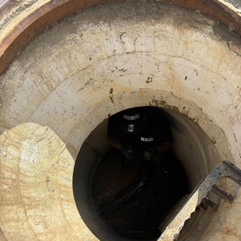 Sewer manhole interior during plumber camera inspection Sewer manhole interior during plumber camera inspection