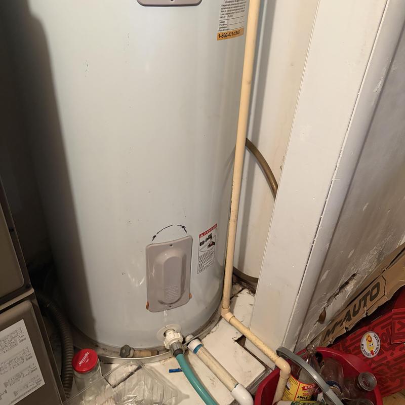Water heater with connected refill and drain pipes
