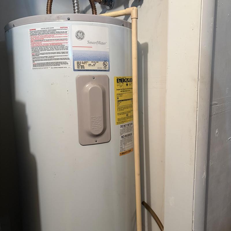 Electric water heater with safety inspection labels