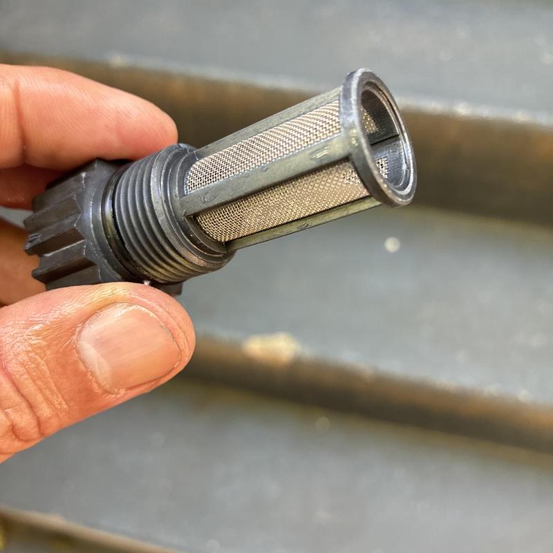 Tankless water heater inlet filter cleaning