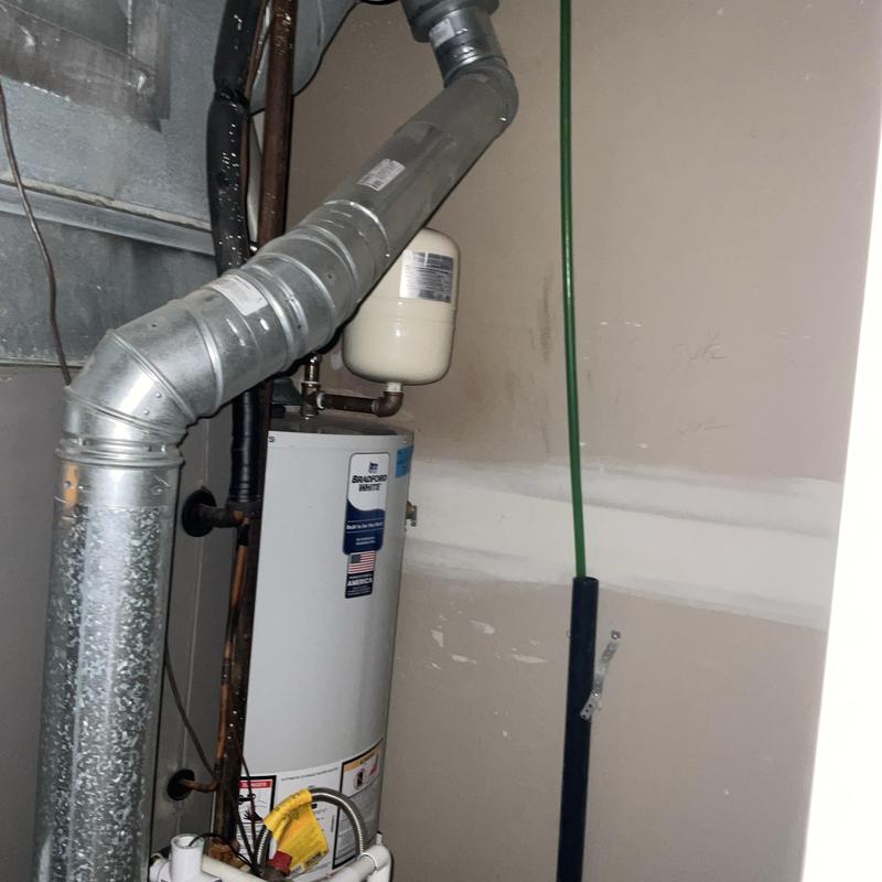 Water heater with vent pipe and expansion tank installation Water heater with vent pipe and expansion tank installation